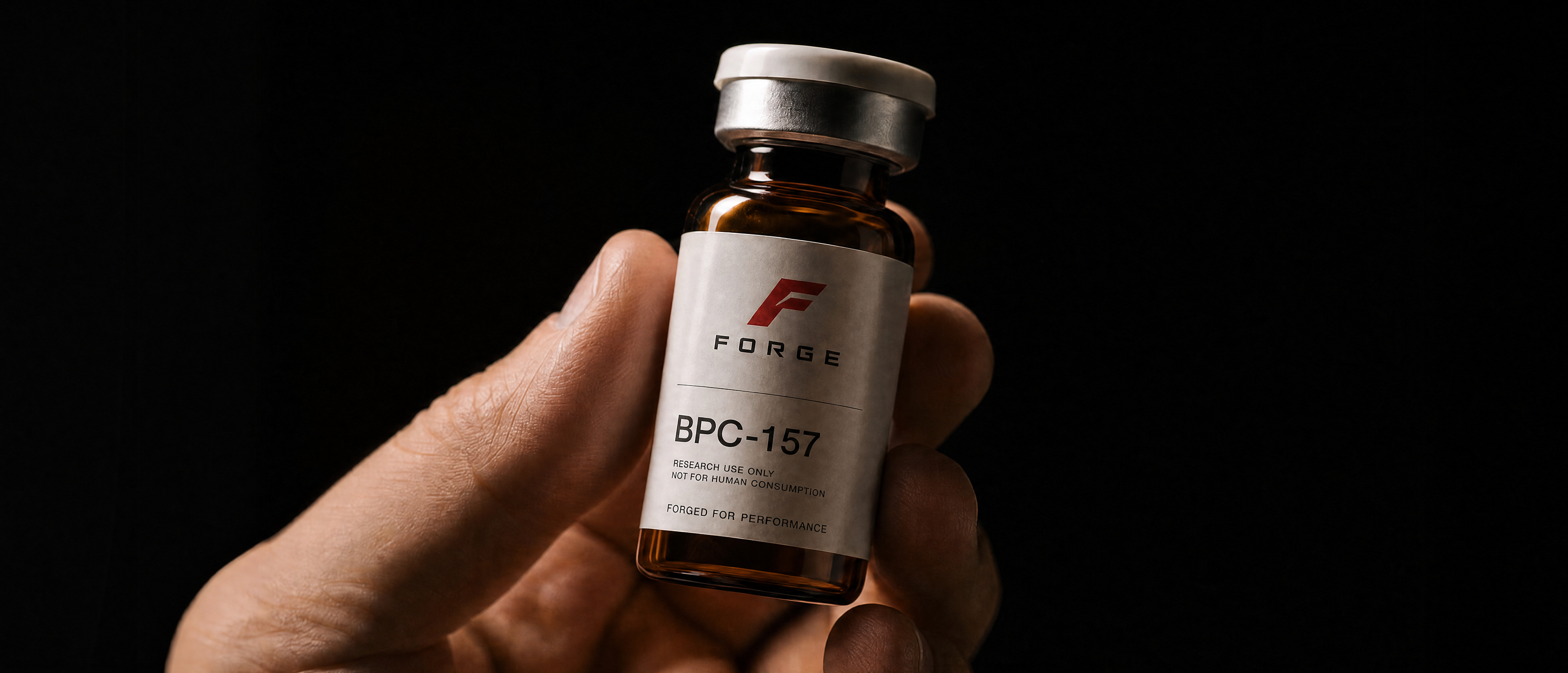 FORGE BPC-157 vial in hand